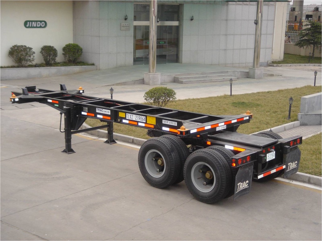 Two-axle intermodal container chassis with landing legs and twist-lock fittings